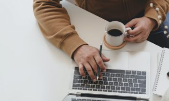 person-using-silver-macbook-pro